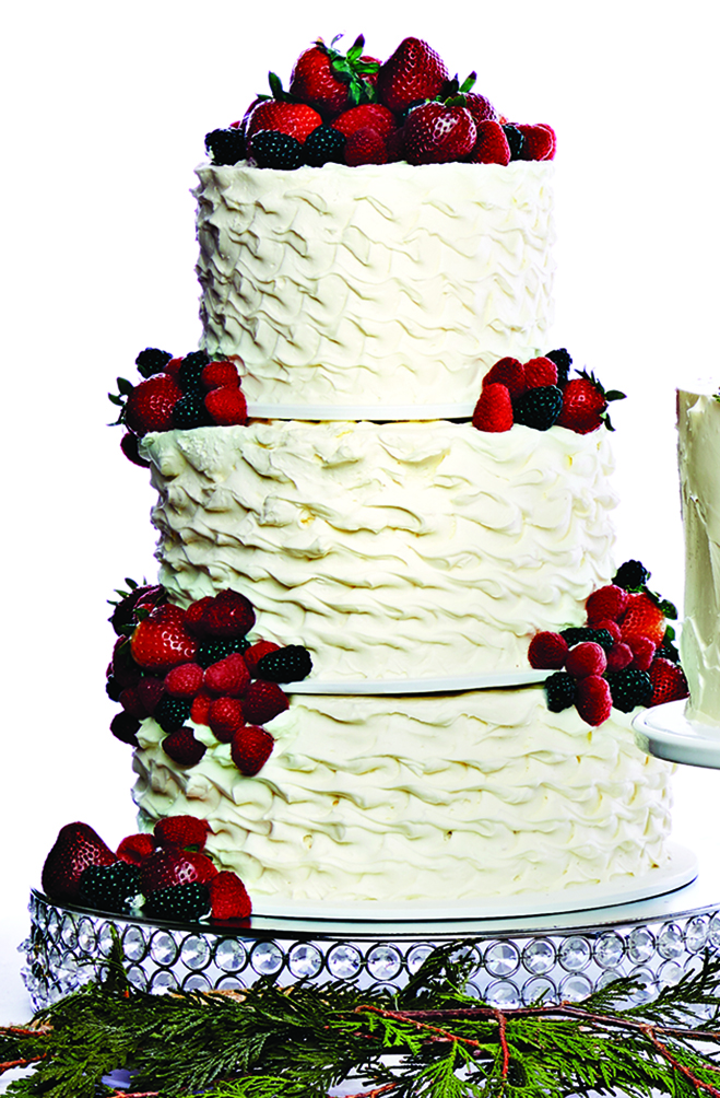 A buttercream cake with raspberries, strawberries and blackberries from Buttercream.